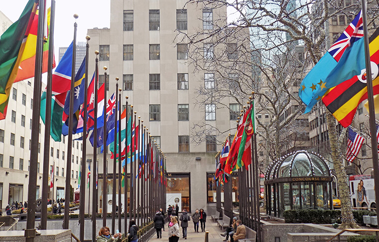 rockefeller center different flags leading up